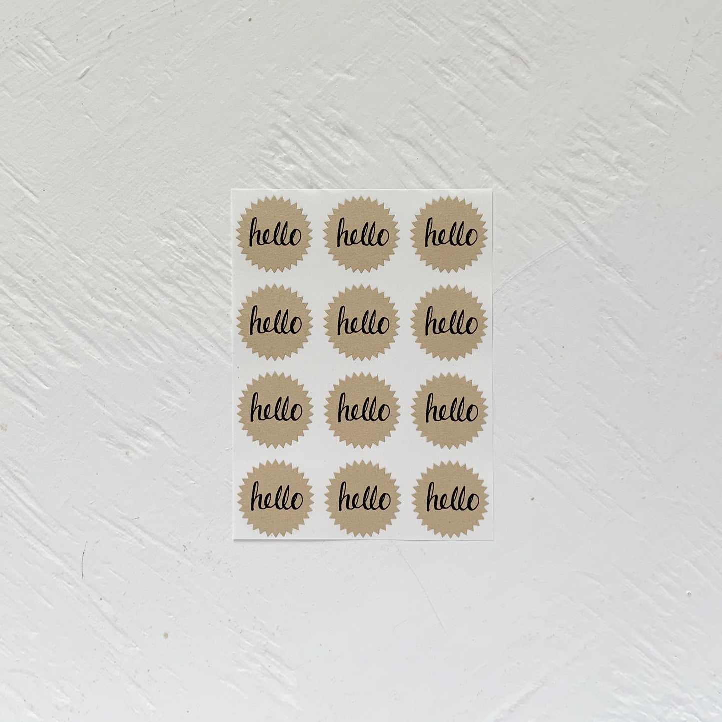 tiny kraft starburst stickers - hello