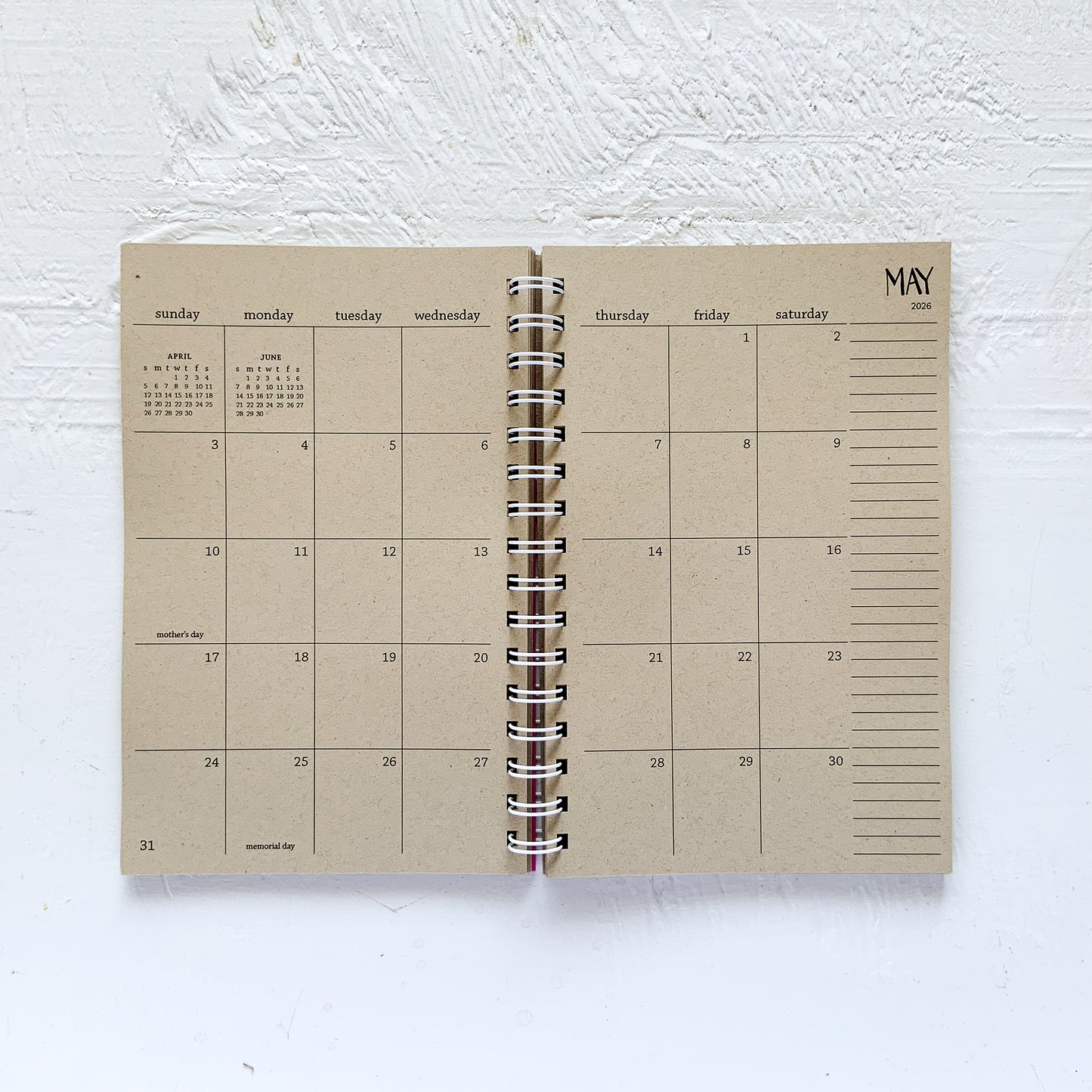 3 year small kraft monthly spiral planner | pages between months | start any time