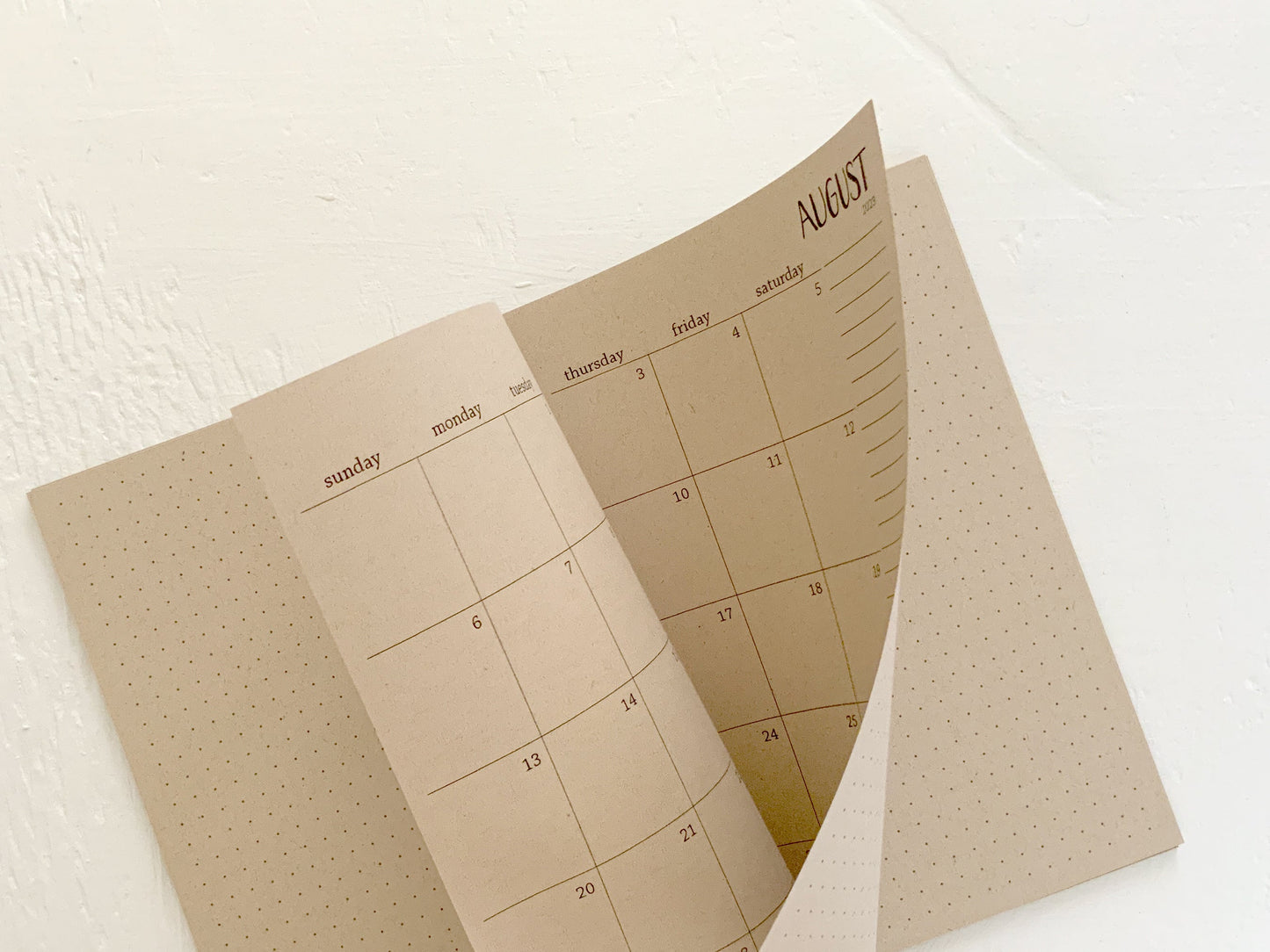 small kraft monthly spiral planner | pages between months | start anytime
