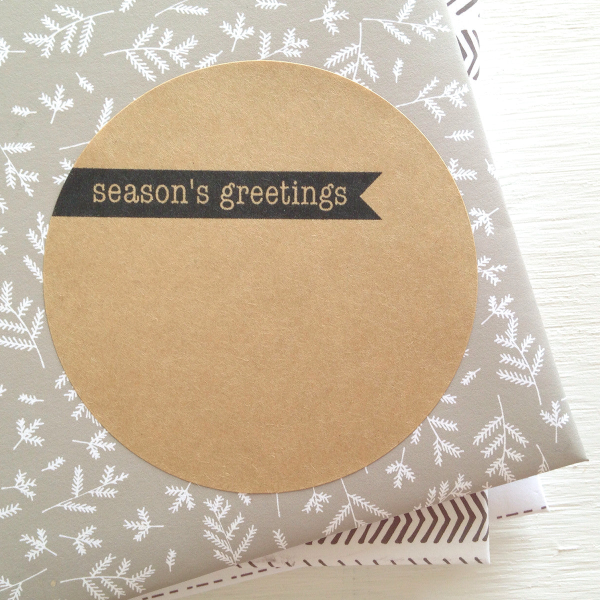 kraft large circle sticker - season's greetings