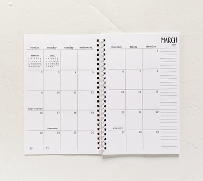 2025 small monthly spiral planner | pages between months