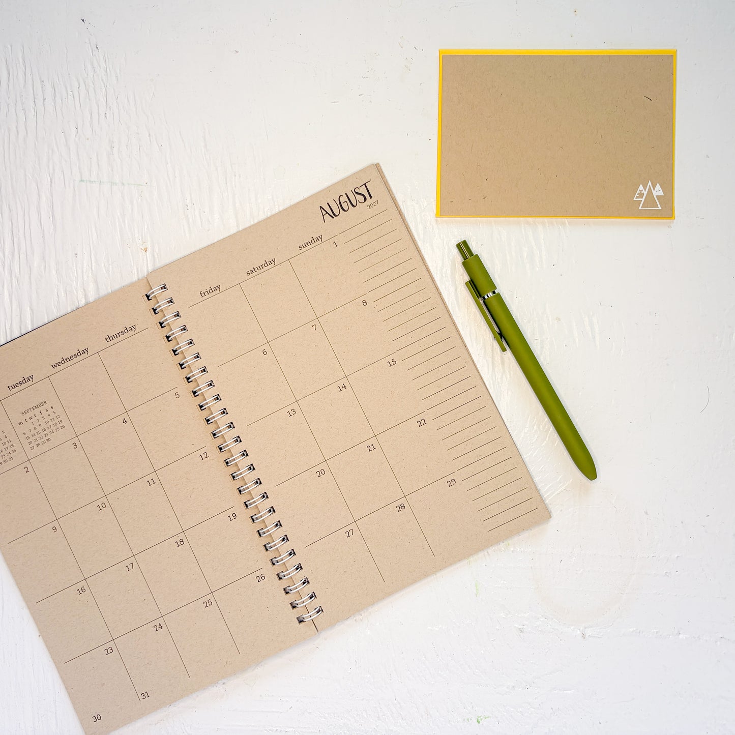2027 small kraft monthly spiral planner | pages between months