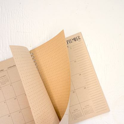 2027 small kraft monthly spiral planner | pages between months