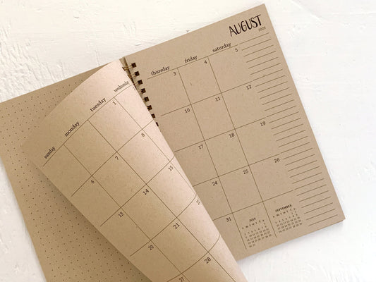 small kraft monthly spiral planner | pages between months | start anytime