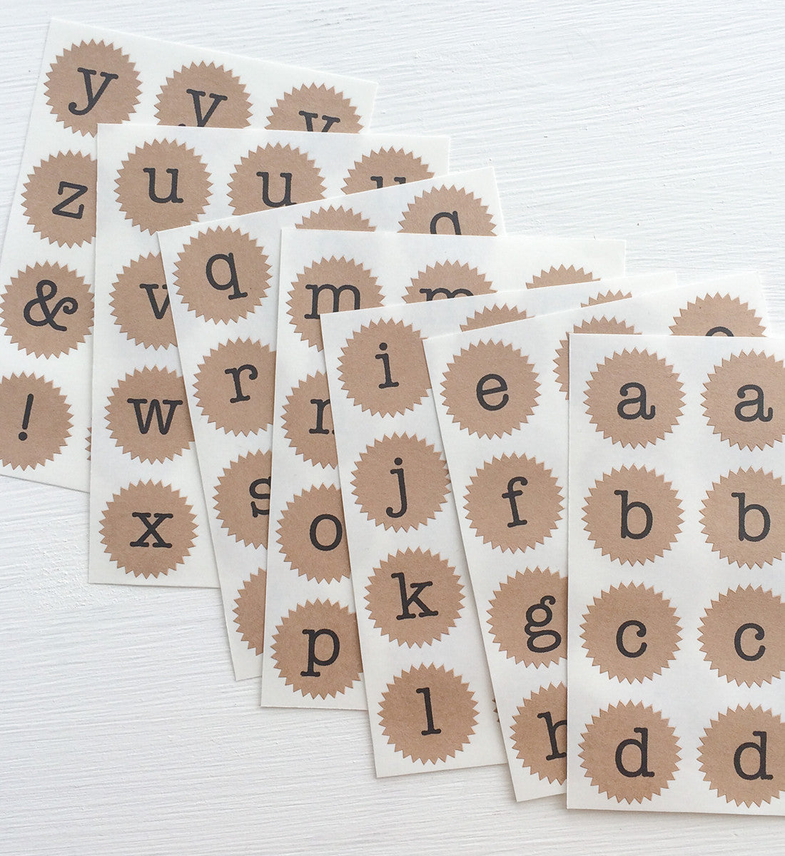 tiny kraft starburst stickers - alphabet