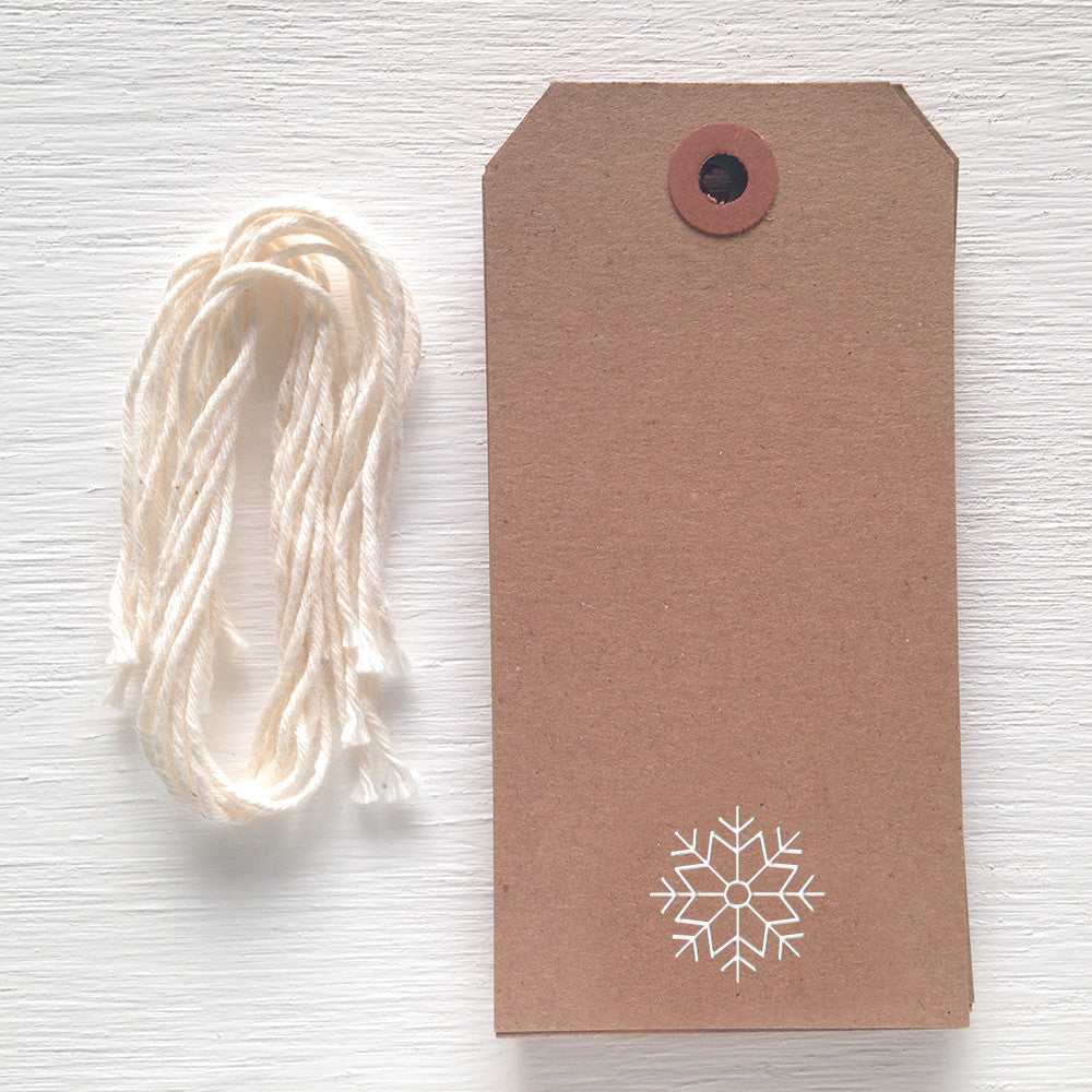 kraft gift tag with white foil snowflake